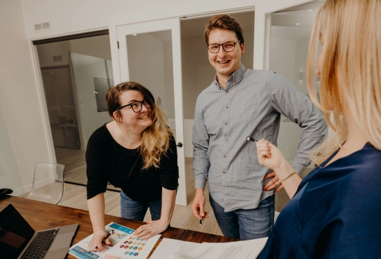 Buildable UX team working on a project in the conference room.